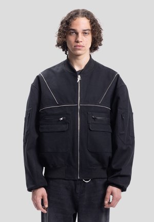 FAVELA CROSS PATCHES - Print T-shirt - black sundried