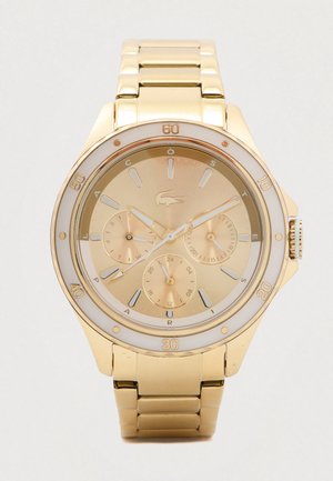 Orologio da polso in metallo dorato con tre sottodial, indicatori delle ore a bastone e un lunetta girevole segnata in incrementi di dieci minuti.