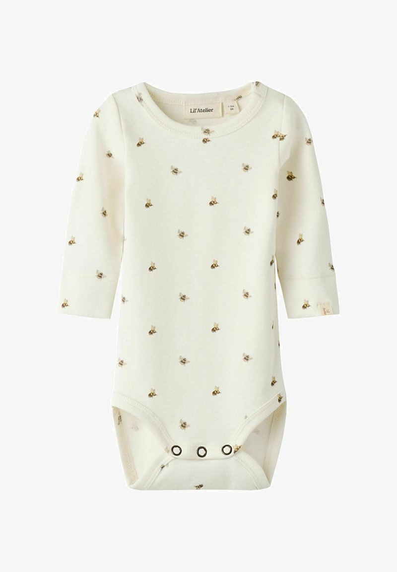 Body bébé à manches longues de couleur crème avec un petit motif d'abeilles, col rond et boutons-pression à l'entrejambe.