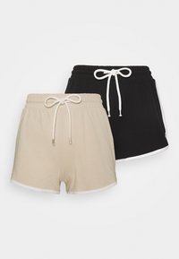 Duas pares de calções de algodão: um em bege, outro em preto. Cada um apresenta uma cintura elástica com cordão e detalhes brancos.