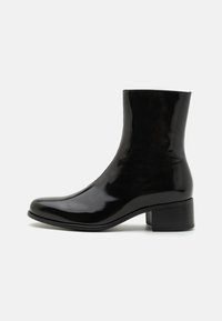 STELLO - Classic ankle boots - black