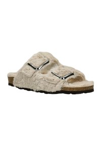 Beige platte slipper met twee verstelbare bandjes en metalen gespen. Kurken voetbed en zwarte rubberen zool met textuur voor grip.