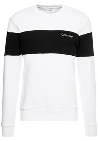 Felpa bianca con una striscia orizzontale nera sul petto. Realizzata in tessuto morbido, con polsini a coste e un piccolo logo sul petto.