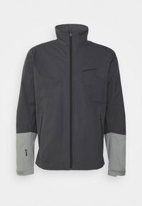 Waterdichte herenjas in donkergrijs met lichtgrijze accenten. Voorzien van een hoge kraag, ritssluiting aan de voorkant en twee zijzakken met rits.