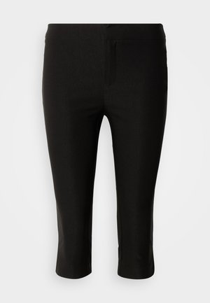 Μαύρο εφαρμοστό παντελόνι cropped με επίπεδη ζώνη μέσης και χωρίς ορατές τσέπες ή διακοσμητικά στοιχεία, σε λευκό φόντο.