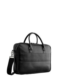 Black leather briefcase with a textured finish, dual rounded handles, adjustable shoulder strap, and a zip closure. Features front and back pockets.