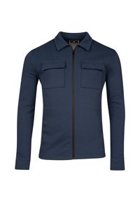 Marine ritsjack gemaakt van gladde stof, met een kraag, twee borstzakken en aangesloten lange mouwen. Eenvoudig ontwerp zonder patronen.