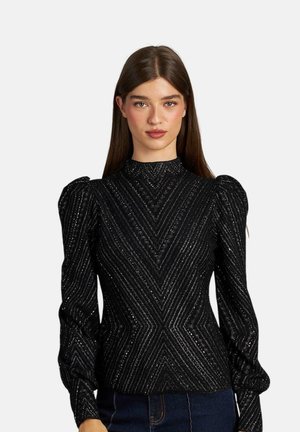 Czarny longsleeve z wysokim dekoltem, ozdobiony wzorem chevronu z cekinami oraz bufkami na ramionach dla dodania objętości.
