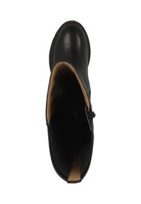 Stivale alla caviglia in pelle nera con punta rotonda e superficie liscia. Interno foderato in materiale beige, dotato di chiusura con zip laterale.