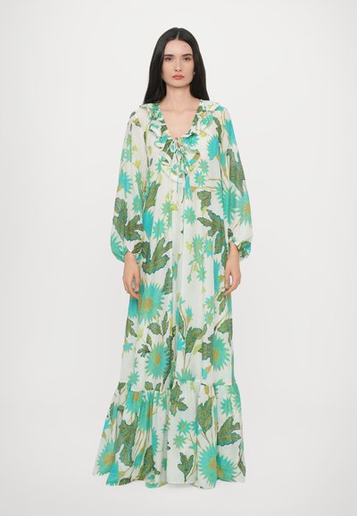 Maxi-jurk van lichte stof met een bloemenpatroon in blauw en groen. Heeft een gerimpelde halslijn en lange mouwen, met een tiered zoom.