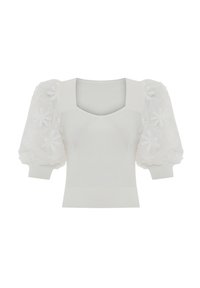 Top bianco in maglia con scollatura quadrata e maniche corte a palloncino decorate con ricami floreali. Il corpo è aderente con una texture a coste sull'orlo.
