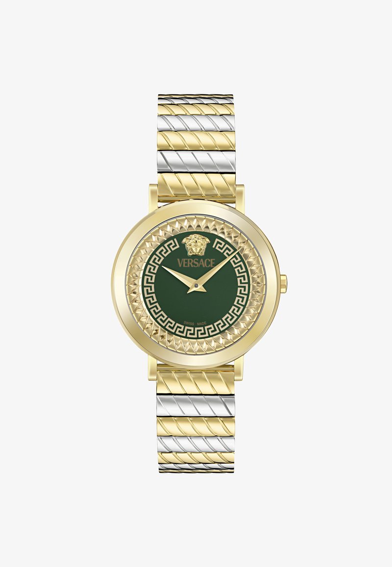 Gold- und silberfarbene Uhr mit grünem Zifferblatt, geprägtem Löwenlogo, geometrisch gemustertem Ring und einem Design aus verdrehten Gliedern.