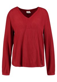 Suéter rojo de manga larga con escote en V, fabricado en tejido texturizado con un ajuste ligeramente holgado. Presenta una tapeta discreta y mangas con puños.