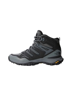 Czarny i szary męski wysokiej góry but trekkingowy z sznurowadłami, wzmocnioną podeszwą i logo The North Face na pięcie.