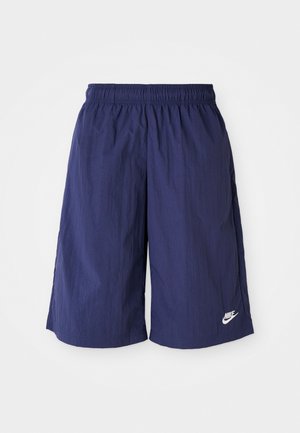 Shorts Nike bleu marine avec une taille élastique, fabriqués en tissu léger et lisse, présentant un petit logo blanc sur le côté inférieur.