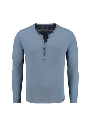 Lange mouwen henley shirt in lichtblauw. Kenmerkend door een knoopsluiting, een zachte textuur en een getailleerd silhouet. Geen zichtbare logo's of patronen.