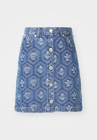 Blue denim skirt with front button closure and floral pattern in light blue and white throughout the fabric.