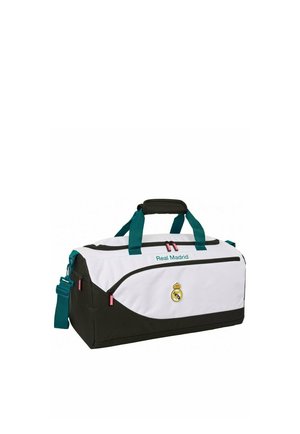 Biało-czarna sportowa torba typu duffel Real Madrid z turkusowymi uchwytami i paskiem na ramię, z logo z przodu i zamykanymi na zamek komorami.