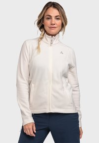 Weißes Fleece-Jacke mit hohem Kragen, Reißverschluss, zwei seitlichen Taschen und einem kleinen Logo auf der Brust, mit einer glatten Textur und sportlichem Design.