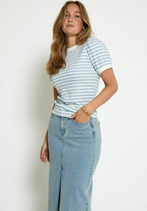 Blue and white striped short-sleeve shirt with ribbed texture, paired with a light blue denim skirt featuring a front slit.