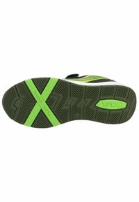 Suola nera di scarpa atletica con accenti verdi, motivo di grip testurizzato e branding "FLEX ZONE" evidenziato in verde.