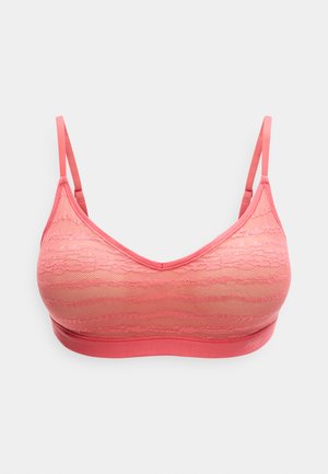 Korallo koronkowy biustonosz typu bralette z gładką taśmą pod biustem, regulowanymi ramiączkami i miękką teksturą. Charakteryzuje się falistym wzorem koronki w lekkim fasonie.