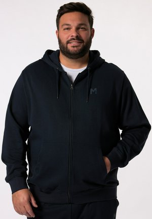 Marinekleurige zip-up hoodie van textuurstof, voorzien van voorzakken, een capuchon met trekkoord en een klein logo aan de bovenkant van de linkerkant.