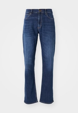 Tamsiai mėlynos džinsinės kelnės su tiesiu kirpimu, klasikiniu penkių kišenių stiliumi ir subtiliais siūlėmis.