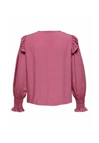 Wydłużona bluzka w kolorze przybrudzonego różu z długim rękawem, w fakturze w kropki, z falbaniastymi ramionami i elastycznymi mankietami, przedstawiona od tyłu.