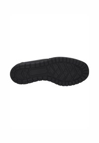 Black rubber shoe sole with patterned tread, featuring deep grooves and a textured surface for improved grip and durability.