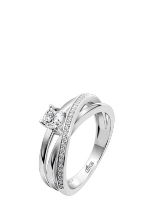 White gold ring featuring a prominent round diamond center and an accent band with small diamonds, showcasing a sleek, intertwined design.