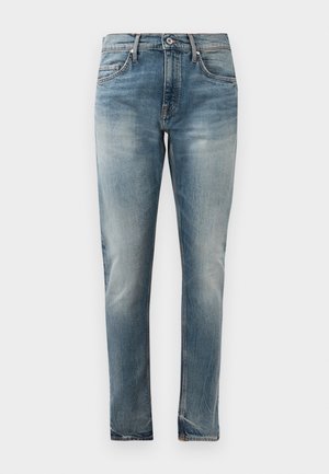Slim-fit blå denimjeans med falmet vask, femlommesstil, knaplukning og subtile slidmærker ved hofterne og knæene.
