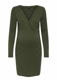 Olivgrön ribbad klänning med långa ärmar, V-ringning föreslående med spetsdetaljer, figursydd design och längd ovanför knäet.