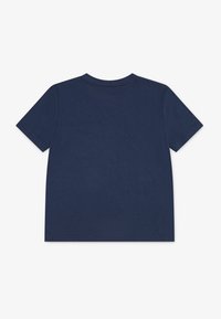 Navy blue cotton t-shirt, short sleeves, crew neck, smooth texture, no visible patterns or accents, plain back design.