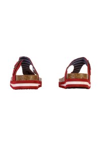 Red sandals with cork footbed, wide straps, and navy and white striped accents. Features two buckles and a textured sole.