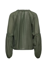 Blusa trasparente verde oliva con motivo a pois testurizzato, maniche lunghe a sbuffo raccolte ai polsini e colletto arricciato, mostrata da dietro.