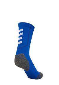 Blauwe sok met een grijze textuurhiel, versterkte teen en een ontwerp met witte strepen. Gemaakt van een rekbaar materiaal voor comfort en ondersteuning.
