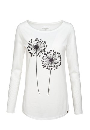 Hvid langærmet skjorte med rund hals og to sorte mælkebøtte-motiver centreret foran.