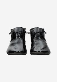 Black ankle boots with a glossy, textured finish, round toe, and lace-up design. The surface features subtle ripples for added detail.