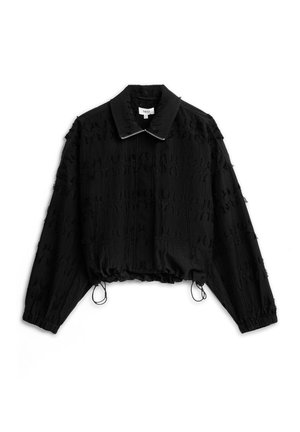 - Kurtka przejściowa