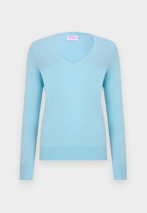 Lyseblå v-hals sweater med lange ærmer, lavet af blødt materiale. Har ribbet tekstur ved manchetter og kant. Etiketten viser "FROM FUTURE."