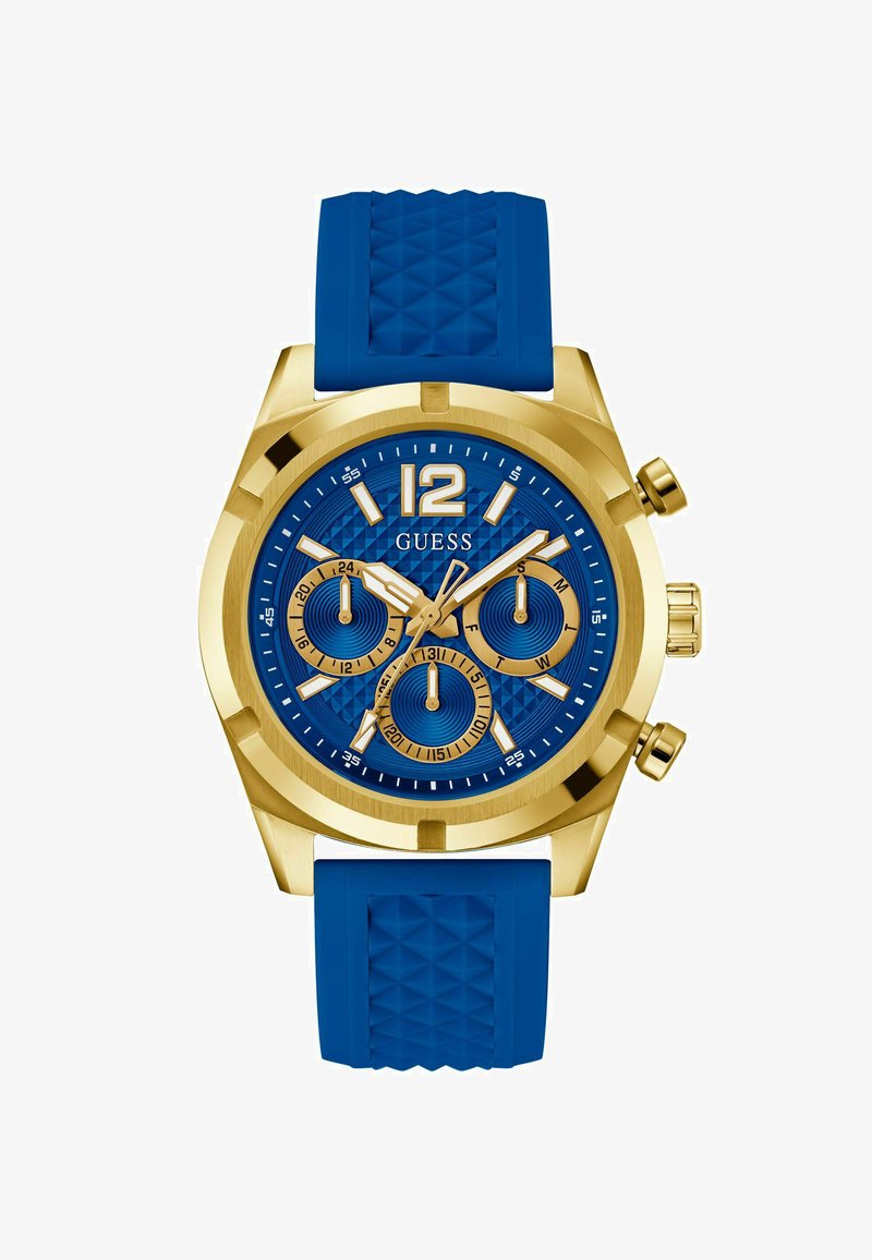 Kuldtooni kell sinise tekstuuriga silikoonrihmaga, millel on sinine kellaplaat, kuldsed tunniindikaatorid ja kolm aladiagrammi. Suur number 12 üleval.