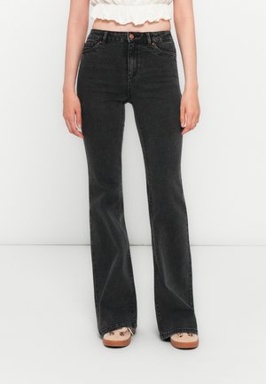Black flared jeans made from denim, featuring subtle stitching details, a button closure, and a mid-rise waist.