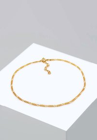 Bracciale in tonalità oro con collegamenti intrecciati e perlati, dotato di chiusura a moschettone e catena regolabile per una lunghezza personalizzabile.