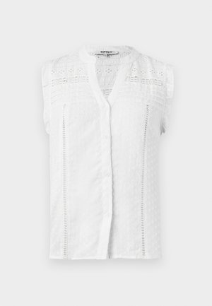 White sleeveless blouse with a button front, textured fabric, lace accents, and ruffled shoulders. Features a classic collar and delicate patterns.