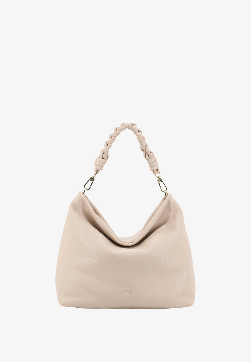 Beige leather handbag with a curved body, braided top handle, and gold-tone hardware. Soft texture with a slouchy silhouette.