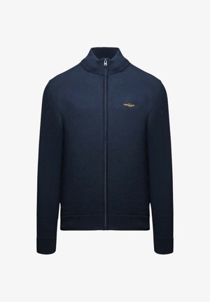 Maglione blu navy con zip in tessuto lavorato a maglia, dotato di collo alto, piccolo logo dorato sul petto sinistro e polsini e orlo a coste.