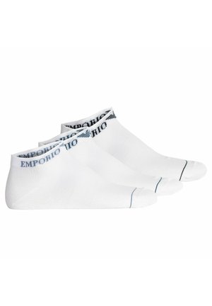 Calzini alla caviglia in cotone bianco con una fascia blu e nera con il logo EMPORIO ARMANI in alto, dettagli reinforcementati sulla punta e sul tallone.