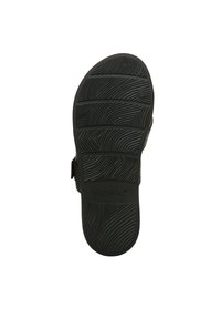 Suola di sandalo in gomma nera con motivo di grip testurizzato, dotata di un plantare sagomato e con il marchio "VIONIC" impresso vicino al tallone.