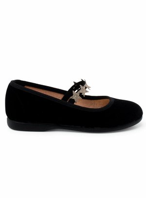 Black velvet ballet flat with a rounded toe, featuring a decorative strap with three sparkly star accents and a flat rubber sole.
